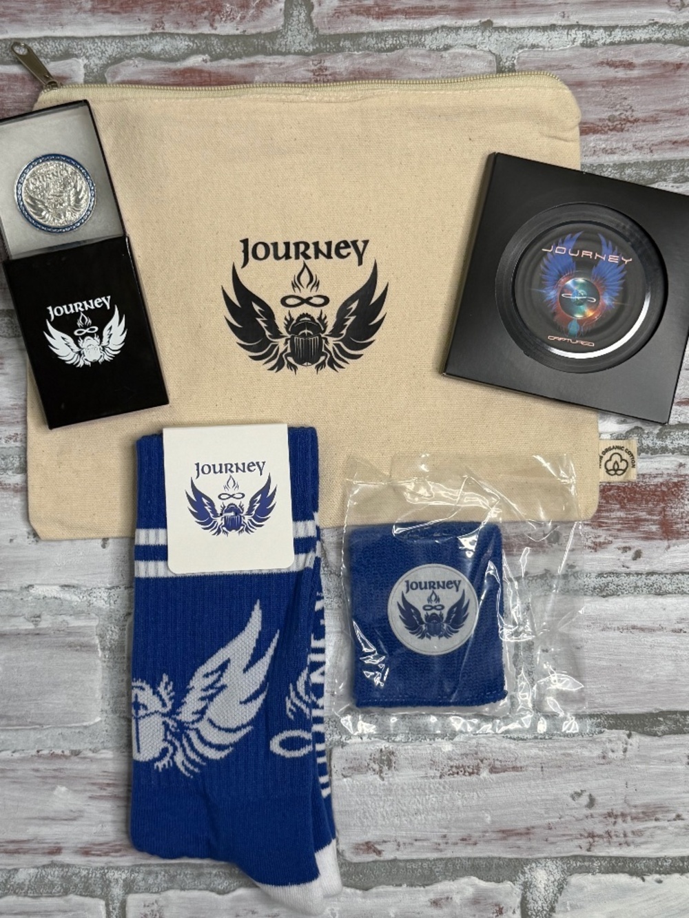 Journey Travel Bag Set with Collector Coin, Socks, Coasters, and Wristband